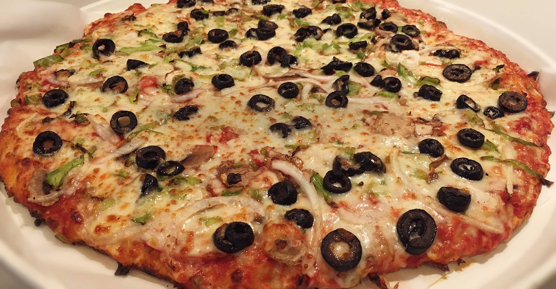 Pizza shown on Sir Pizza Key Biscayne’s official website
